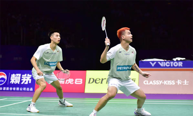 Ong Yew Sin/Teo Ee Yi make the Singapore Open quarter-finals. (photo: Shi Tang/Getty Images)